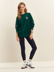Grün - Sweatshirt mit Rundhalsausschnitt, Grafik und Seitenstreifen - Bild 2 von 6