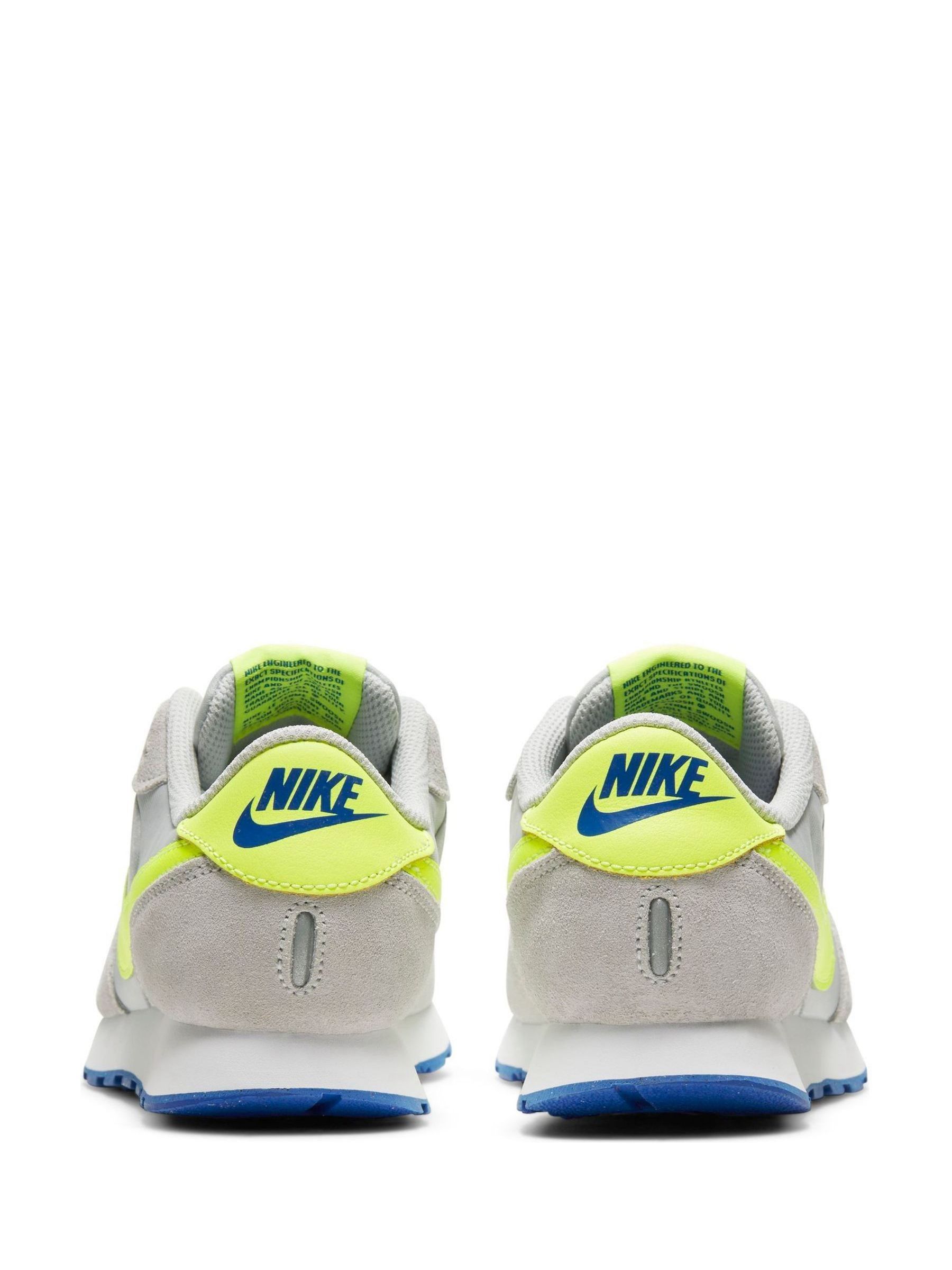 Nike grey and yellow trainers store