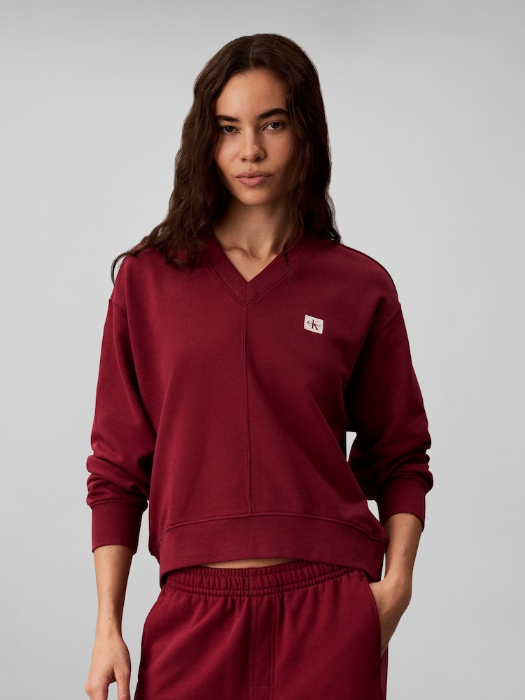 Calvin Klein Red Relaxed Woven Monologo French Terry Sweatshirt - Image 1 of 7 Calvin Klein Red Relaxed Woven Monologo French Terry Sweatshirt - Image 1 of 7