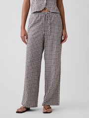 Pantalones de pernera ancha de tiro medio en mezcla de lino con cuadros sin cierres de Gap - Imagen 1 de 6
