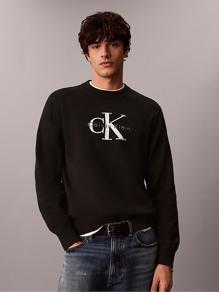 Calvin Klein Black Relaxed Cotton Monologo Graphic Jumper - Image 1 of 4 Calvin Klein Black Relaxed Cotton Monologo Graphic Jumper - Image 1 of 4