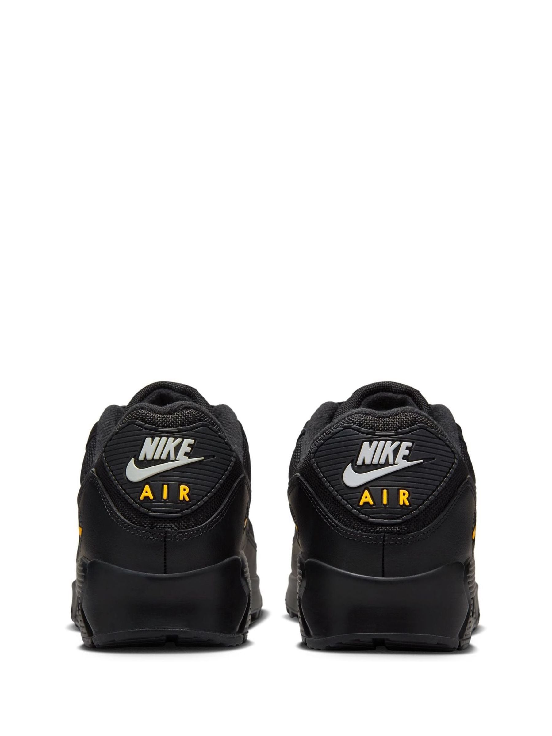 Buy Nike Black Yellow Air Max 90 Trainers from Next Germany
