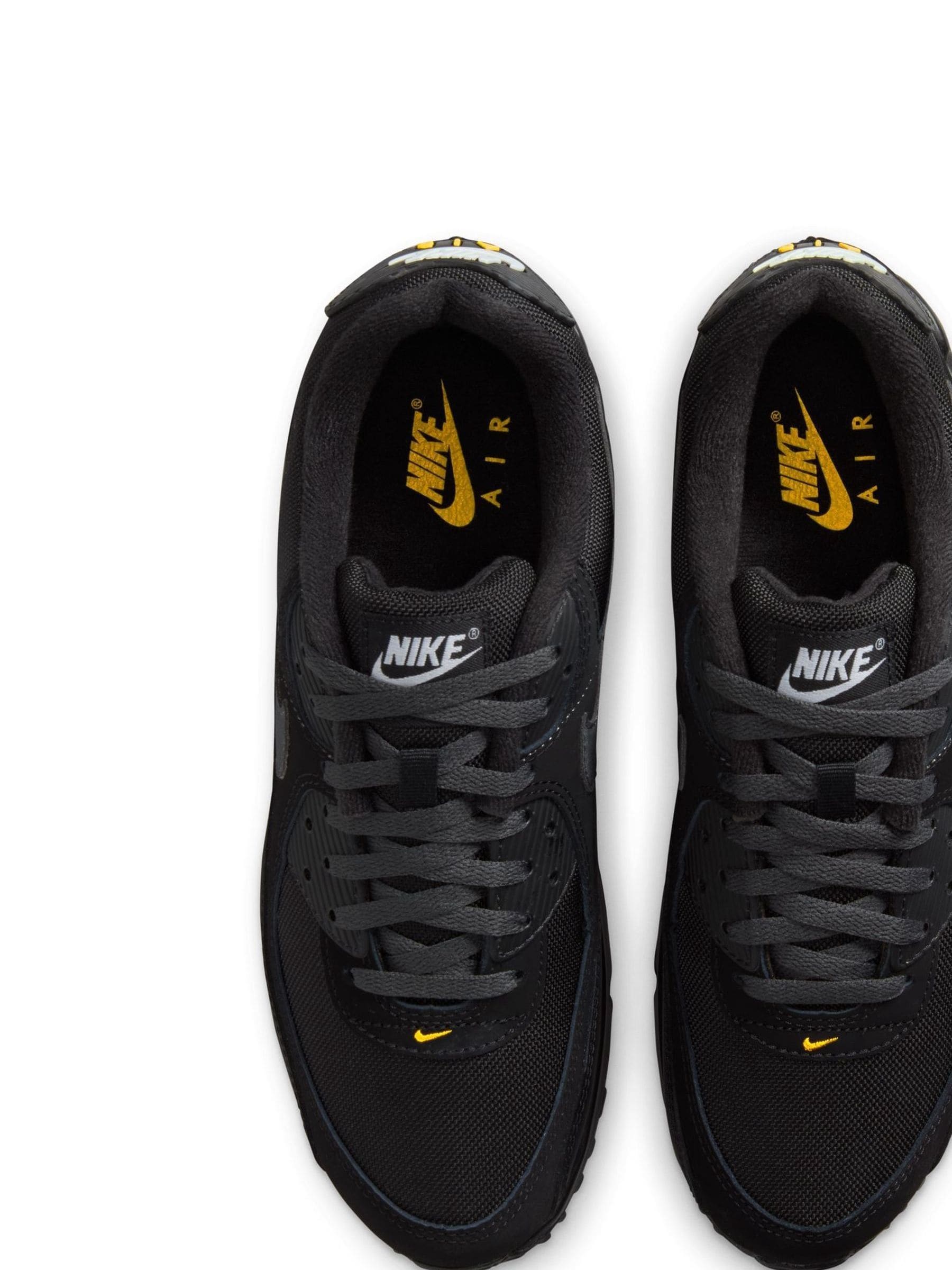 nike yellow tick trainers