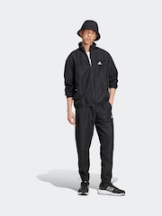 Schwarz - adidas Sportswear gewebter Trainingsanzug in Colourblock-Optik - Bild 4 von 7