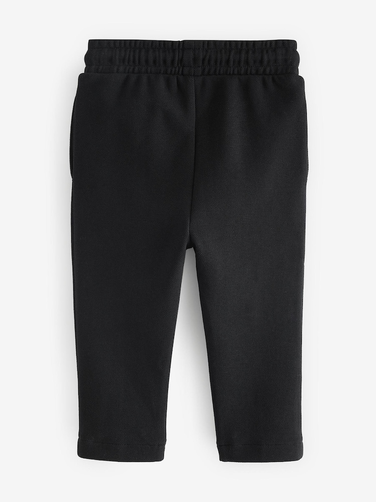 Schwarz - Pikee-Jogginghose mit Biesen (3 Monate–7 Jahre) - Bild 2 von 3