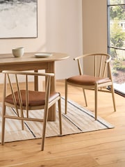Set of 2 Distressed Faux Leather Tan Stockholm Light Wood Leg Dining Chairs - Image 1 of 8