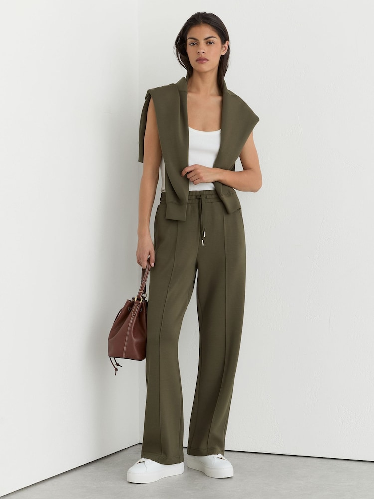Reiss Khaki Green Jemma Premium Interlock Wide-Leg Joggers - Image 1 of 7 Reiss Khaki Green Jemma Premium Interlock Wide-Leg Joggers - Image 1 of 7