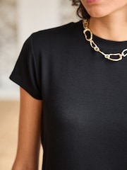 Negro - Camiseta de manga corta de canalé con diseño suave al tacto con TENCEL™ Lyocell - Imagen 4 de 6