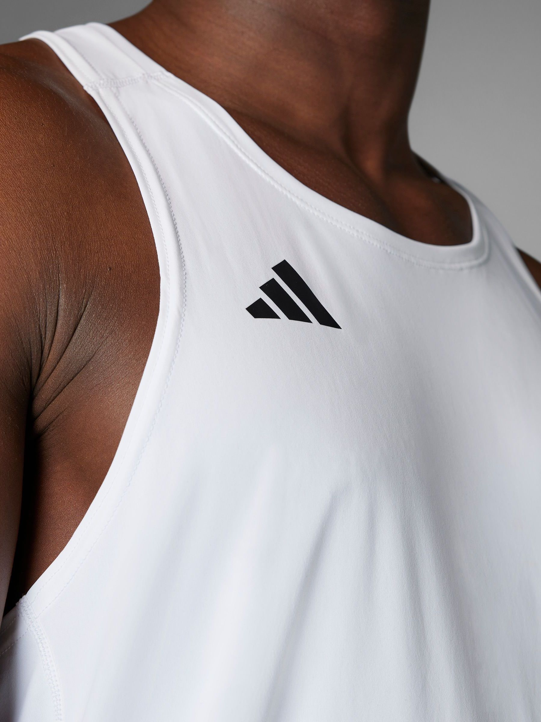Buy adidas White Adizero Essentials Running Singlet Vest from Next USA