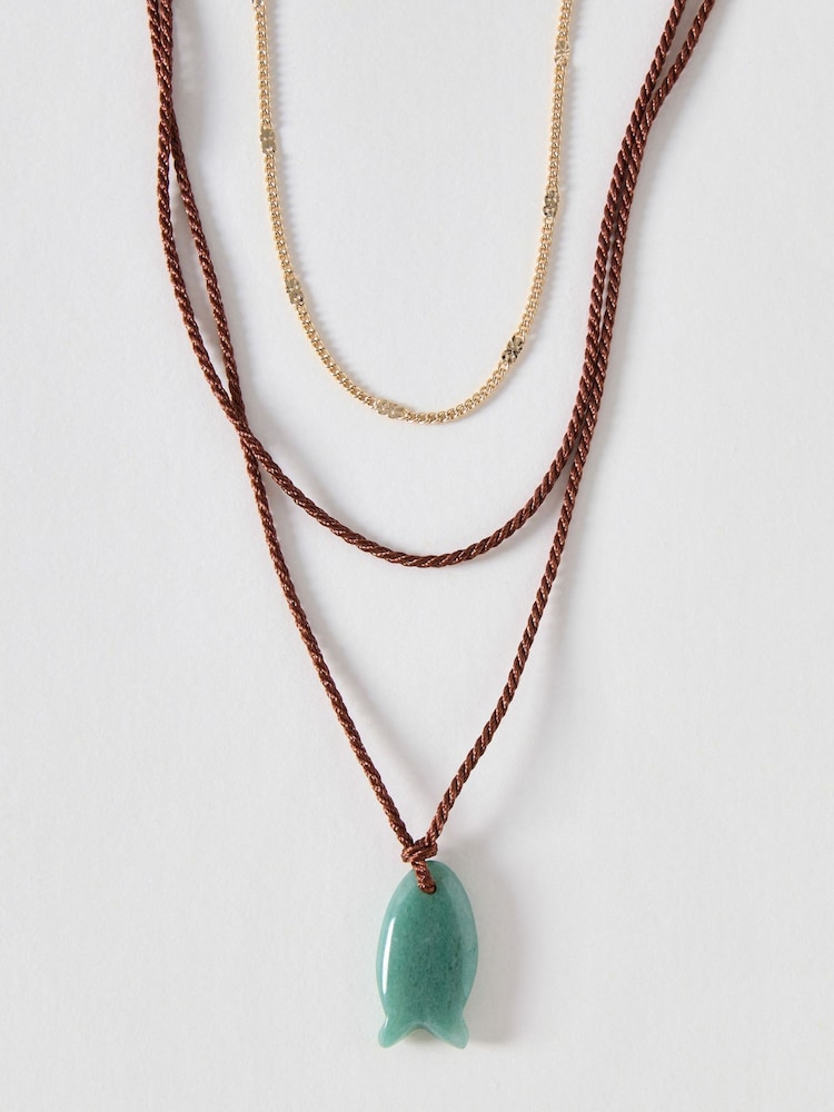 Oliver Bonas Brown Florice Fish Pendant Triple Row Cord Necklace - Image 1 of 3 Oliver Bonas Brown Florice Fish Pendant Triple Row Cord Necklace - Image 1 of 3