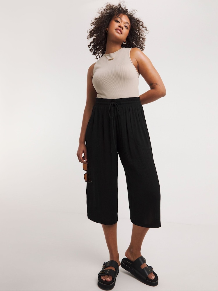 Simply Be Crinkle Tie Waist Wide Leg Black Culottes - Image 1 of 4