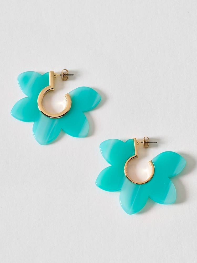 Oliver Bonas Blue Emmy Blue Flower Resin Hoop Earrings - Image 1 of 2 Oliver Bonas Blue Emmy Blue Flower Resin Hoop Earrings - Image 1 of 2
