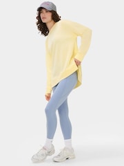 أصفر - سويت شيرت بثنيات دقيقة بنمط ناعم ولون باهت من Sweaty Betty - صورة 1 من 3
