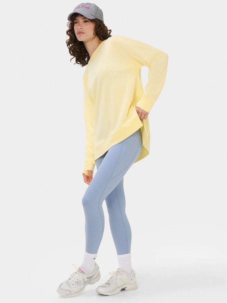 أصفر - سويت شيرت بثنيات دقيقة بنمط ناعم ولون باهت من Sweaty Betty - صورة 1 من 3 أصفر - سويت شيرت بثنيات دقيقة بنمط ناعم ولون باهت من Sweaty Betty - صورة 1 من 3