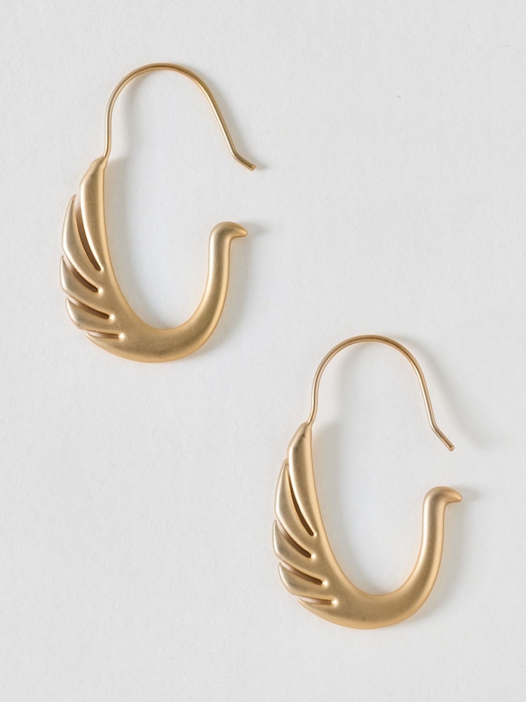 Oliver Bonas Gold Tone Miri Brushed Metal Swan Wire Hoop Earrings - Image 1 of 2 Oliver Bonas Gold Tone Miri Brushed Metal Swan Wire Hoop Earrings - Image 1 of 2