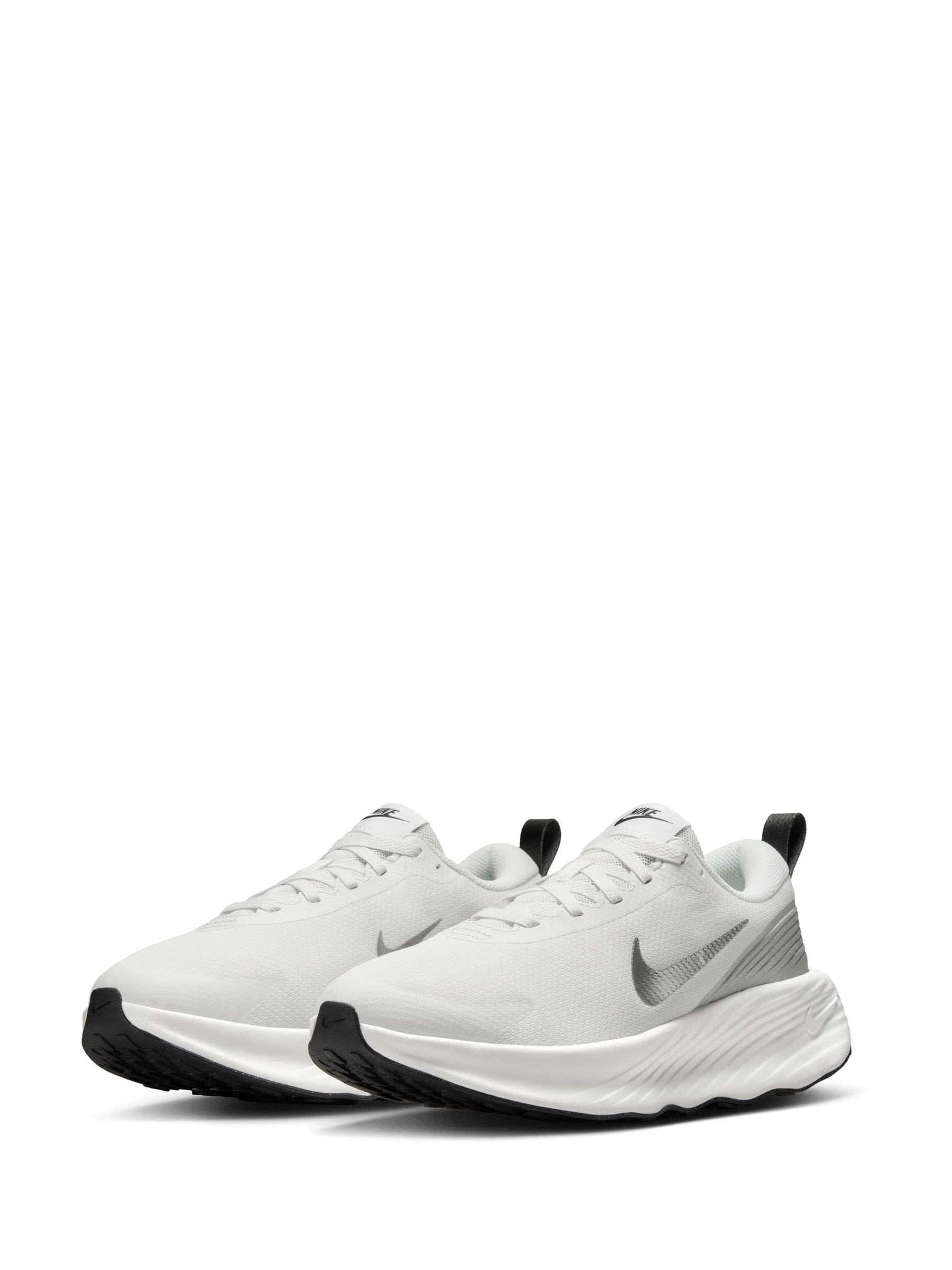 Buy Nike White Silver Promina Walking Trainers from Next Luxembourg