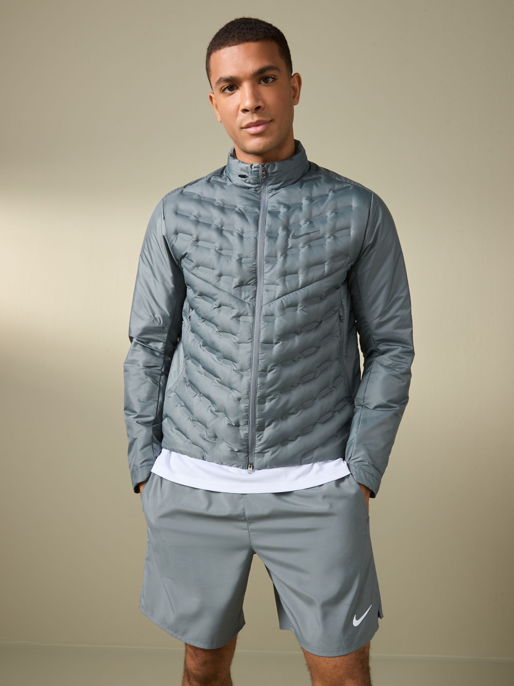 Nike grey running jacket deals