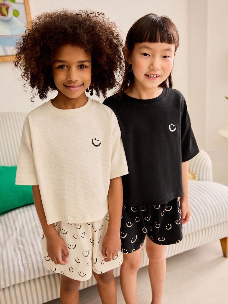 Schwarz/Weiss/Smiley - Kurze Pyjamas im 2er-Pack (3–16Jahre) - Bild 1 von 9 Schwarz/Weiss/Smiley - Kurze Pyjamas im 2er-Pack (3–16Jahre) - Bild 1 von 9