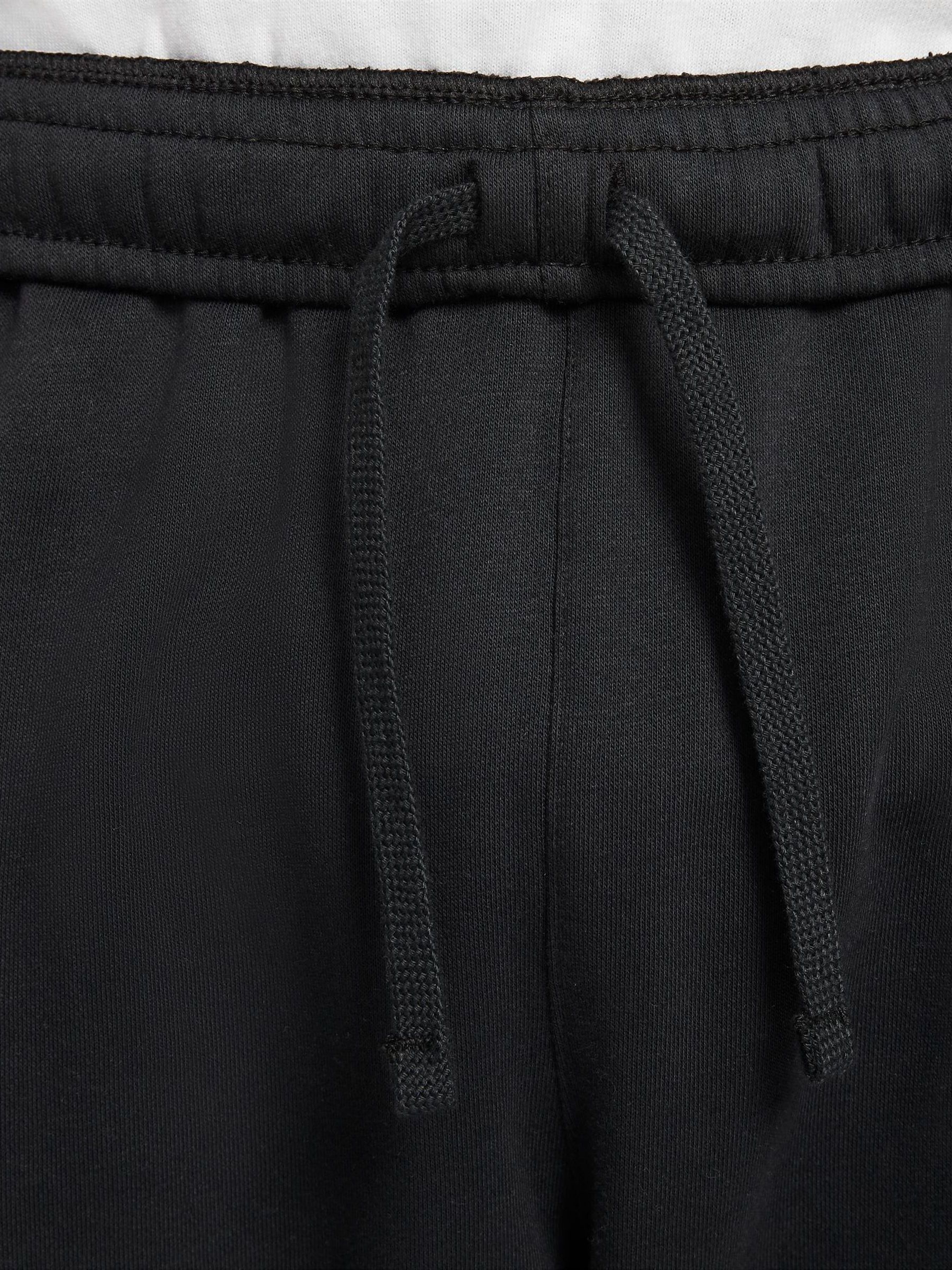 nike club cuffed joggers in black