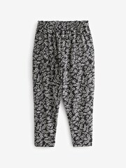 Schwarz/Weiß mit Blumenprint - Leichte Jerseyhose mit Stretch (3–16 Jahre) - Bild 6 von 7
