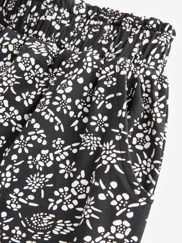 Schwarz/Weiß mit Blumenprint - Leichte Jerseyhose mit Stretch (3–16 Jahre) - Bild 7 von 7