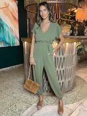 AX Paris Khaki Green V-Neck Short Sleeve Belted Elasticated Cuff Jumpsuit - Image 1 of 4