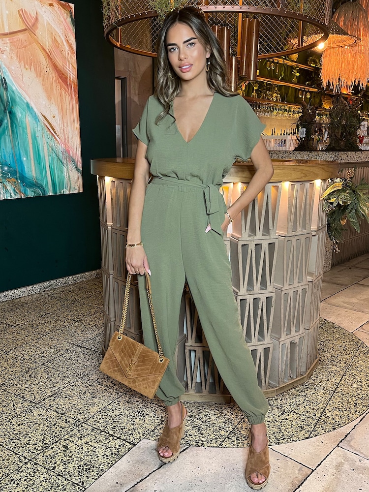 AX Paris Khaki Green V-Neck Short Sleeve Belted Elasticated Cuff Jumpsuit - Image 1 of 4