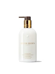 Molton Brown Mesmerising Oudh & Gold Hand Lotion 300ml - Image 1 of 2