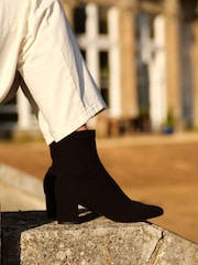 Russell & Bromley Black Suede Carrington Ankle Block Heel Sock Boots - Image 1 of 10