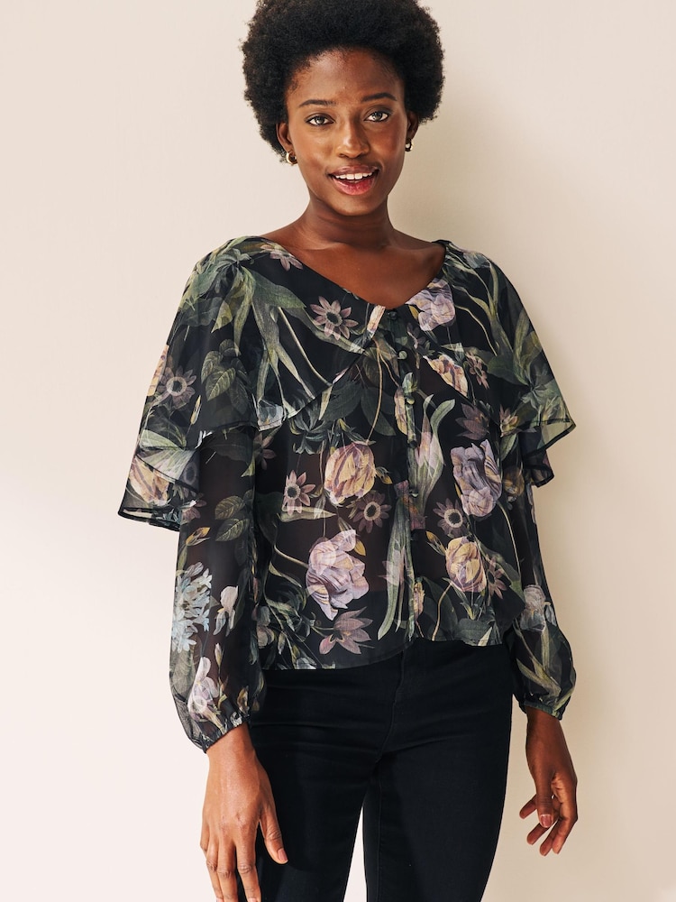 Grün mit floralem Print - Cape Langarmbluse - Bild 1 von 5 Grün mit floralem Print - Cape Langarmbluse - Bild 1 von 5