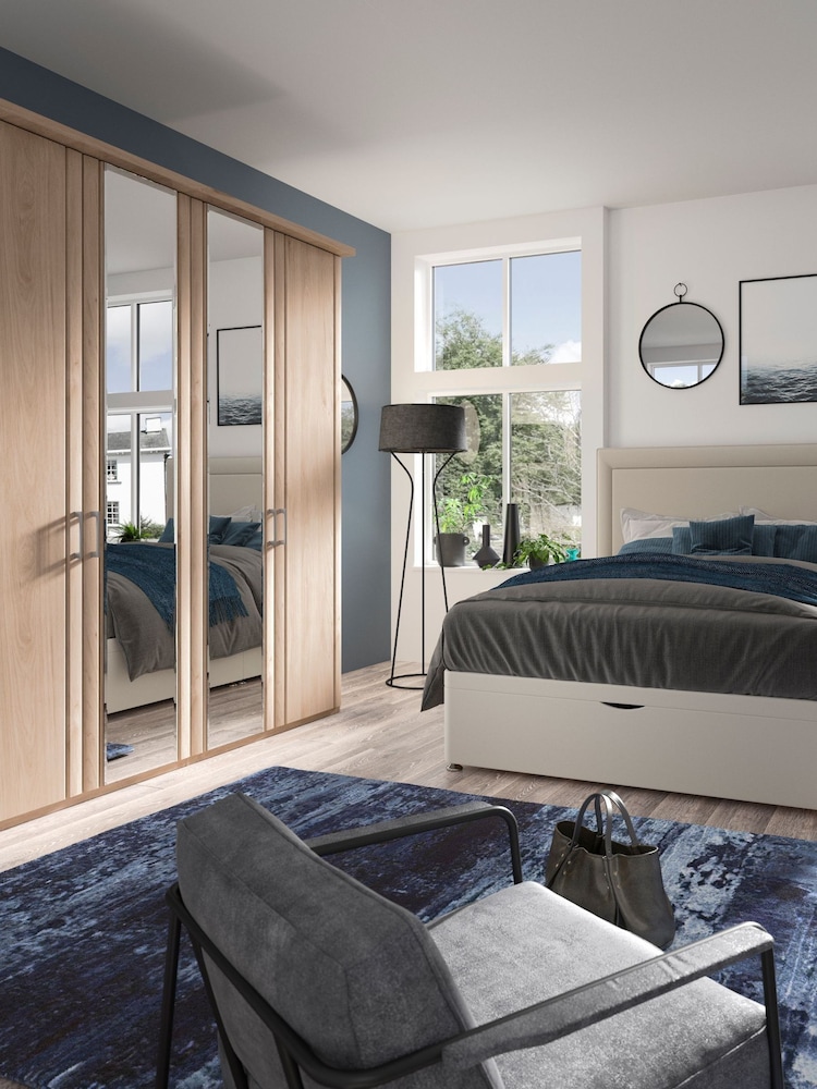 Wiemann Holm Oak Torquay Wood and Mirror Semi Fitted 4 Door Wardrobe - Image 1 of 4
