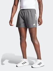 رمادي - شورت Own The Run من adidas  - صورة 1 من 5