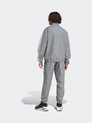 Grau - adidas Sportswear gewebter Trainingsanzug in Colourblock-Optik - Bild 2 von 6
