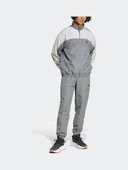 Grau - adidas Sportswear gewebter Trainingsanzug in Colourblock-Optik - Bild 6 von 6