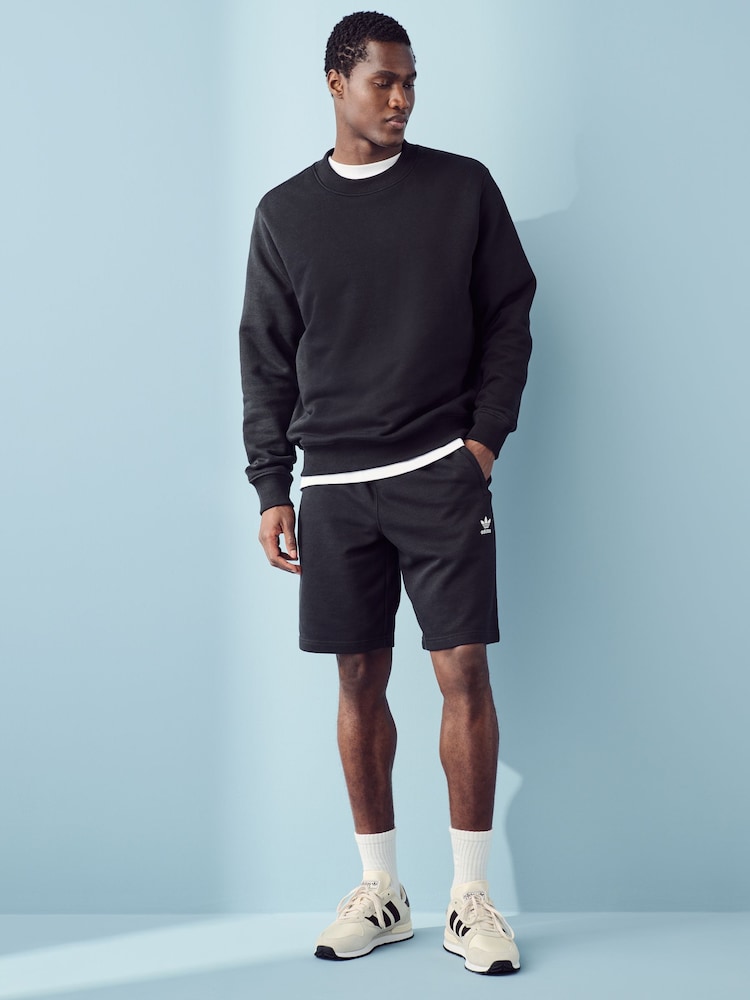 Negro - Pantalones cortos básicos de algodón 100 % con diseño de trébol de Adidas Original - Imagen 2 de 5