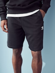Negro - Pantalones cortos básicos de algodón 100 % con diseño de trébol de Adidas Original - Imagen 4 de 5