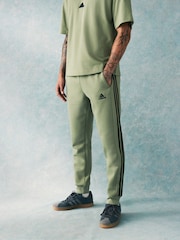 adidas Green Essentials 3 Stripe Joggers - Image 1 of 5