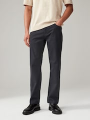 Negro - Pantalones rectos estilo vaqueros en denim elástico suave al tacto con estampado - Imagen 1 de 10