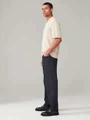 Negro - Pantalones rectos estilo vaqueros en denim elástico suave al tacto con estampado - Imagen 3 de 10