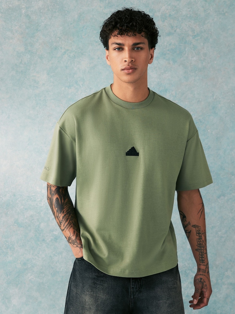 Grün - adidas City Escape T-Shirt - Bild 1 von 6