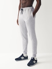 Schwarz - Jogginghose aus Baumwollmischung mit Bündchen - Bild 1 von 7