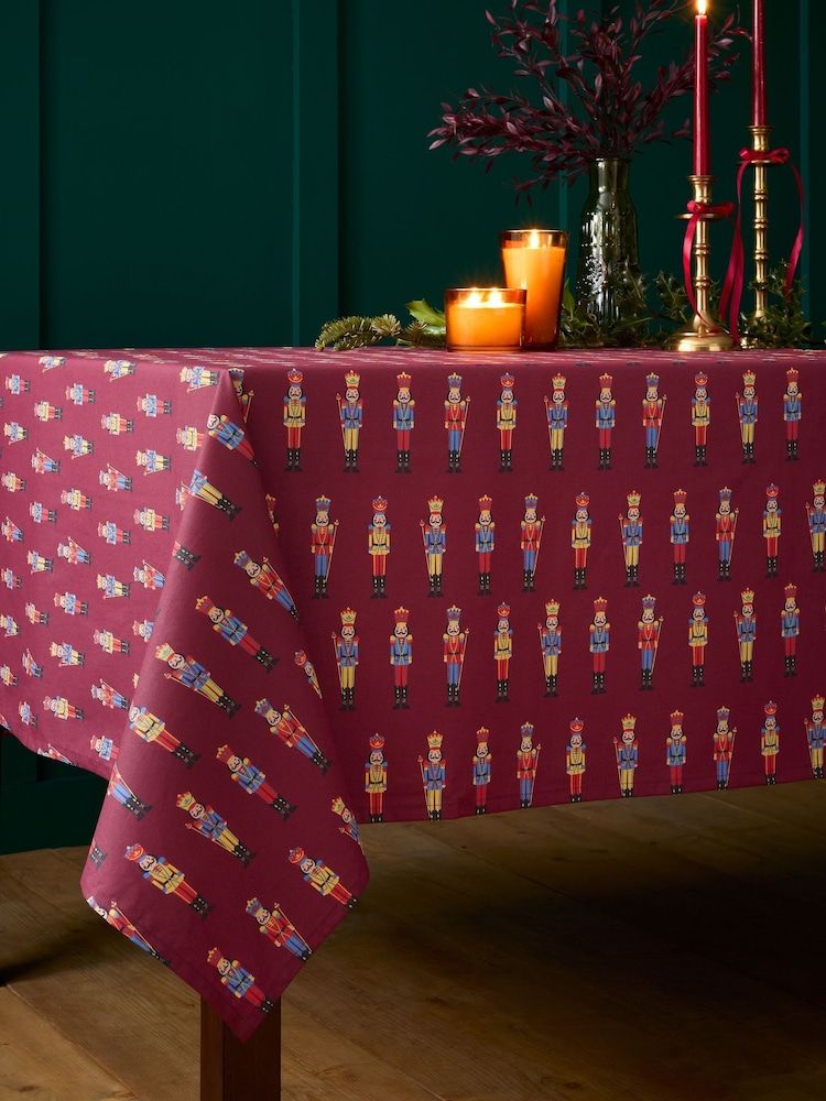 Catherine Lansfield Plum Christmas Nutcracker Wipe Clean Table Cloth - Image 2 of 2 Catherine Lansfield Plum Christmas Nutcracker Wipe Clean Table Cloth - Image 2 of 2