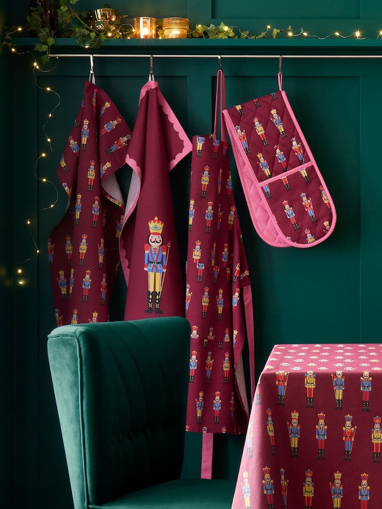 Catherine Lansfield Plum Christmas Nutcracker Cotton Apron - Image 2 of 2 Catherine Lansfield Plum Christmas Nutcracker Cotton Apron - Image 2 of 2