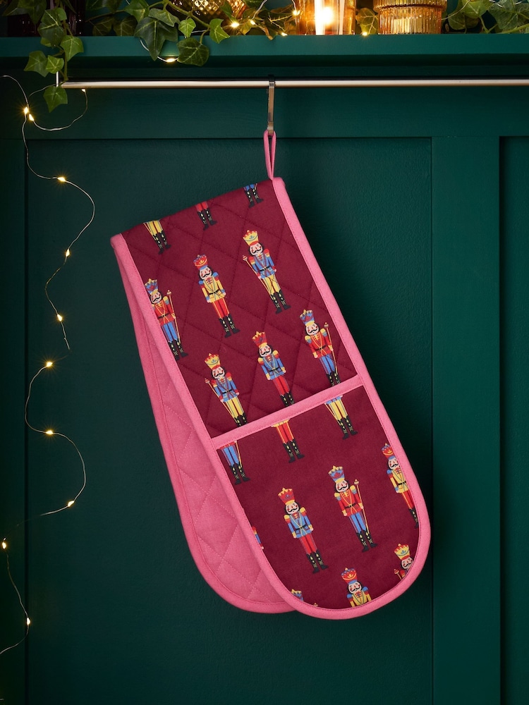 Catherine Lansfield Plum Christmas Nutcracker Double Oven Cotton Gloves - Image 1 of 2 Catherine Lansfield Plum Christmas Nutcracker Double Oven Cotton Gloves - Image 1 of 2