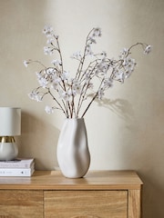 Artificial Blossom Stem Arrangement in White Ceramic Vase - Image 1 of 3