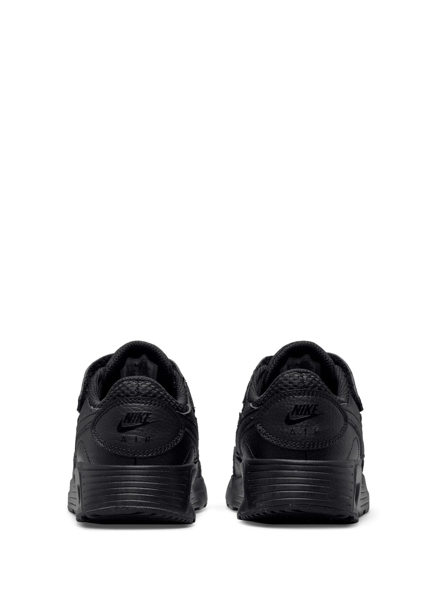 Black leather nike trainers junior store