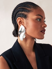 Silver Tone Molten Folded Statement Earrings Made With Recycled Brass - Image 1 of 3