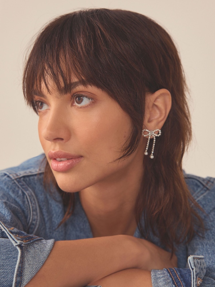 Silver Tone Sparkle Bow Earrings - Image 2 of 3