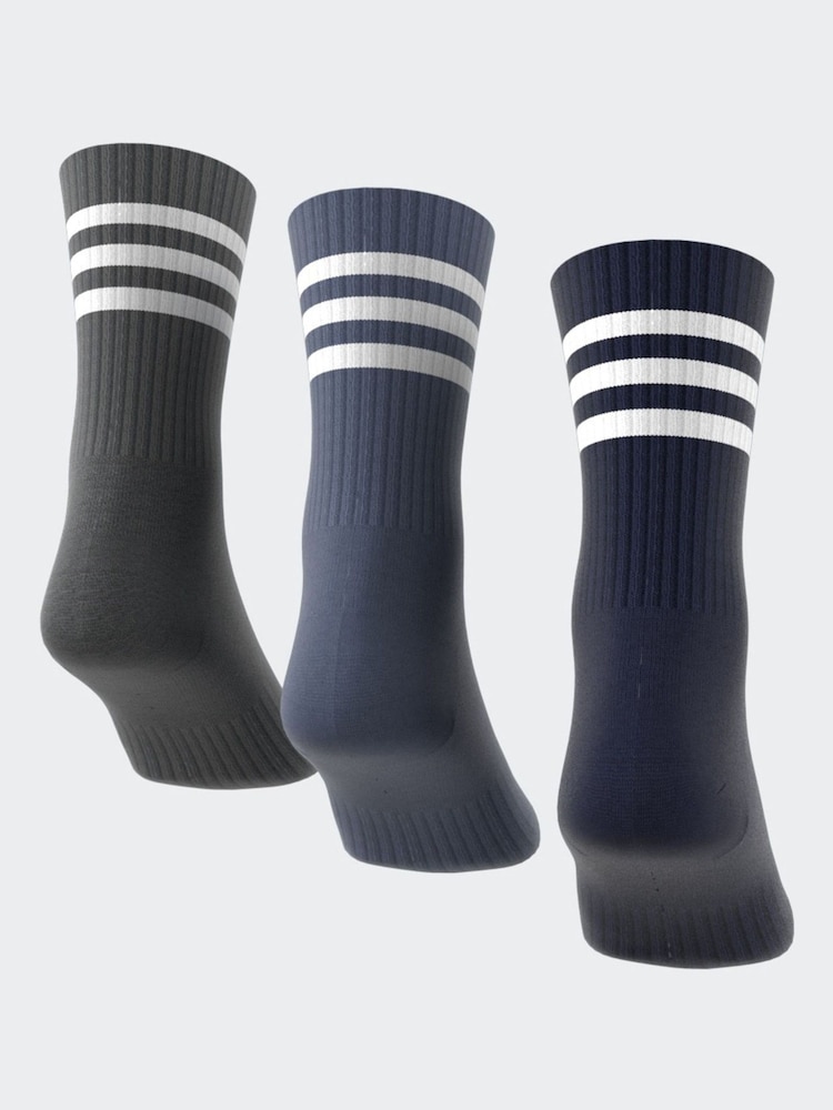 أزرق - حزمة من 3 جوارب بطول يصل إلى منتصف الساق مزينة بـ 3-خطوط من adidas - صورة 2 من 7 أزرق - حزمة من 3 جوارب بطول يصل إلى منتصف الساق مزينة بـ 3-خطوط من adidas - صورة 2 من 7