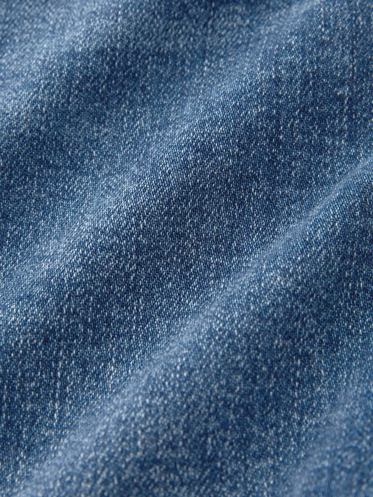 כחול כהה - מכנסי ג'ינס בגזרת שעון חול רחבה - תמונה 10 מתוך 10